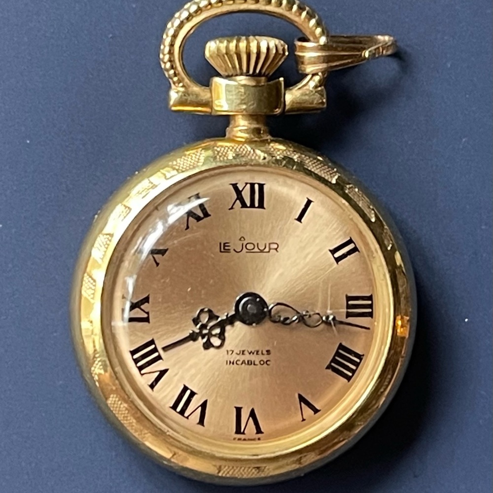 Beautiful Gold Watch pendant the size of a quarter